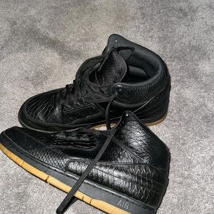 Black python nike airs high tops